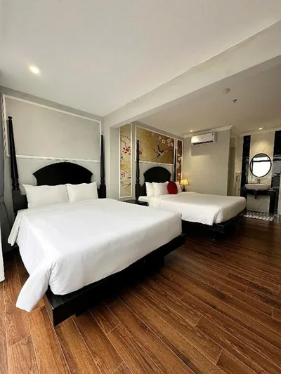 발코니가 있는 쿼드러플룸 — Amara Hanoi Hotel and Spa